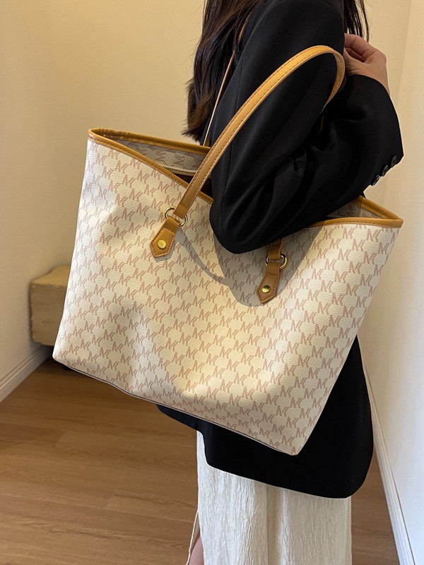 Bolsa de gran capacidad de dama de alta calidad 2025, nuevo tipo de bolso de hombro versátil, bolso de mano de viaje retro de moda