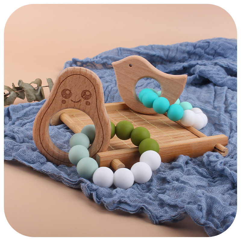 Nueva DIY creativo de dibujos animados juguete de haya mordedor bebé Beech biberón cuentas de silicona pulsera teether stick