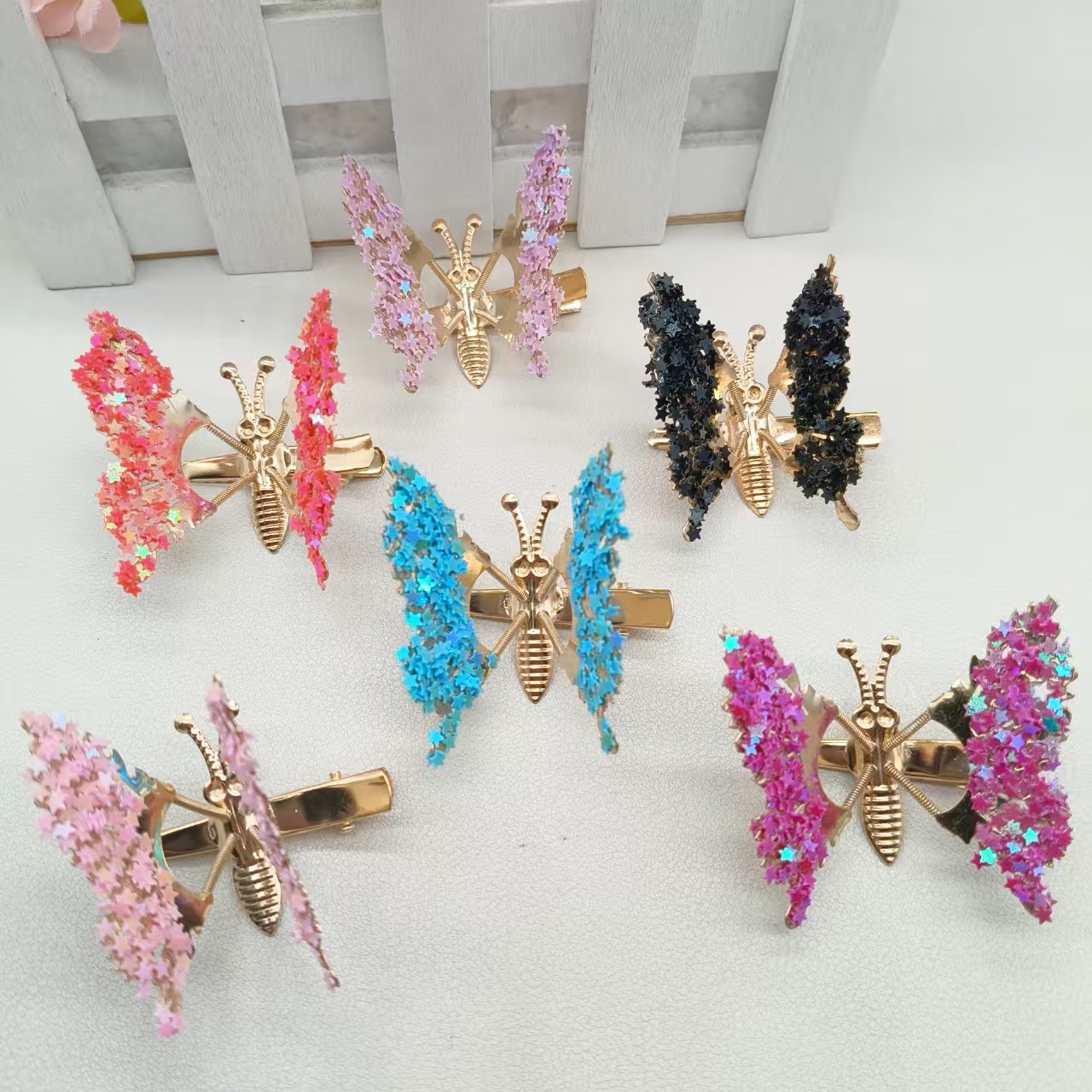 星星镶钻会动的蝴蝶发夹五角星少女心头饰高级感怀旧儿童礼品地摊