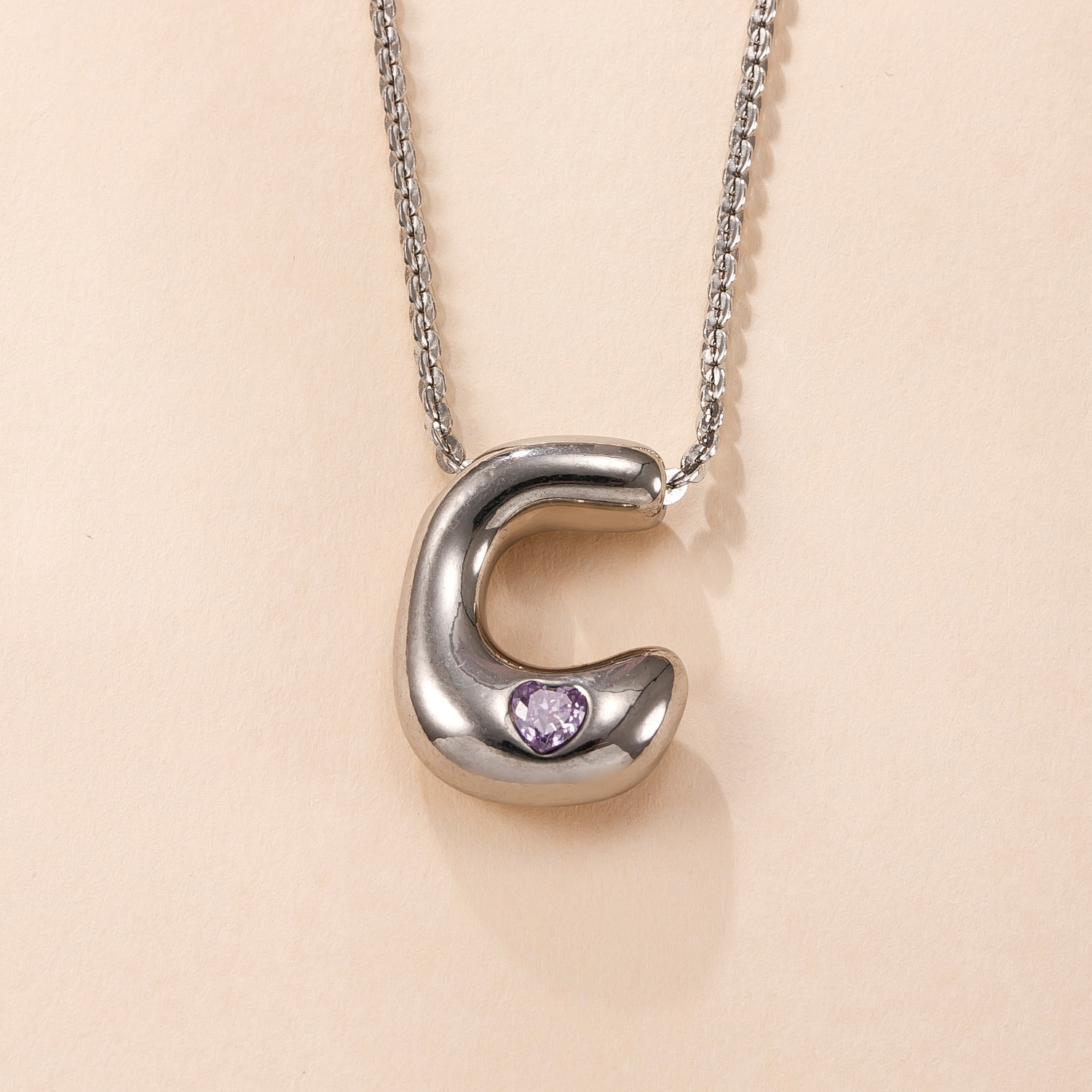 Colgante único transfronterizo de joyería de acero inoxidable fundición con incrustaciones de diamantes de color 26 letras accesorios de collar moda simple pulsera briy