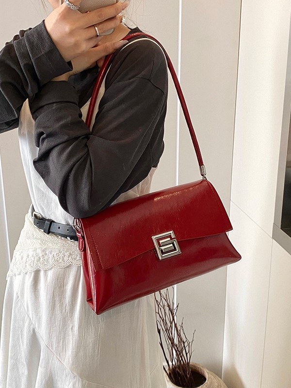 2025 nuevo bolso axilar de alta calidad bolso retro ocio de moda nicho pequeño bolso de cera de lujo ligero