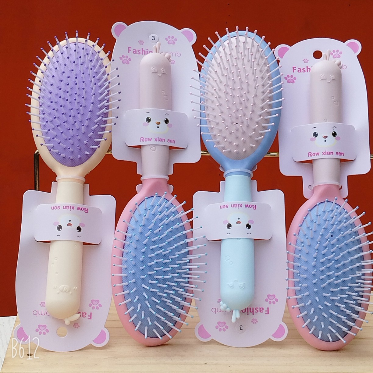 Bonito peine de peinado color macarrón con cojín de aire para masaje, adecuado para uso doméstico y dormitorios estudiantiles, cepillo de pelo de plástico suave con cojín de aire.