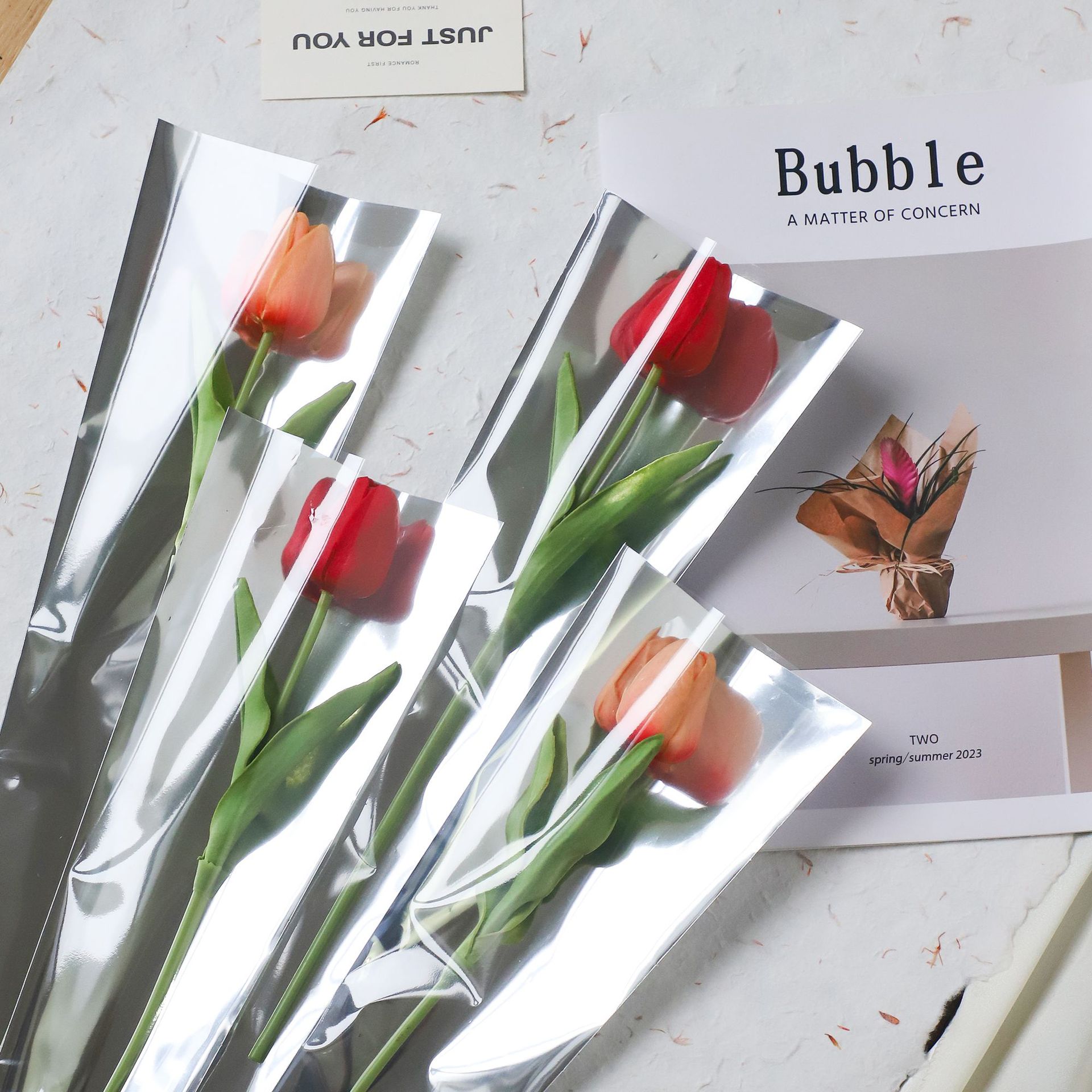 Li Zhi Ran espejo rosa bolsa única impermeable simple reflectante bolsa de flores