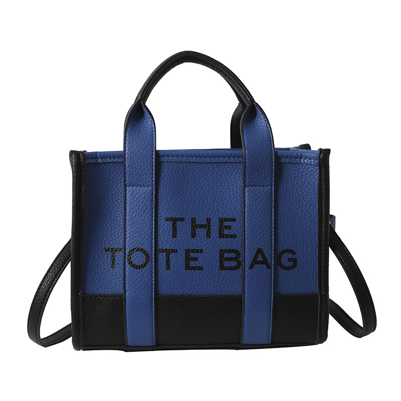 Bolso tote de comercio exterior para mujer 2023, nuevo bolso de mano moderno europeo y americano, bolso bandolera con estampado de letras y bloques de color.
