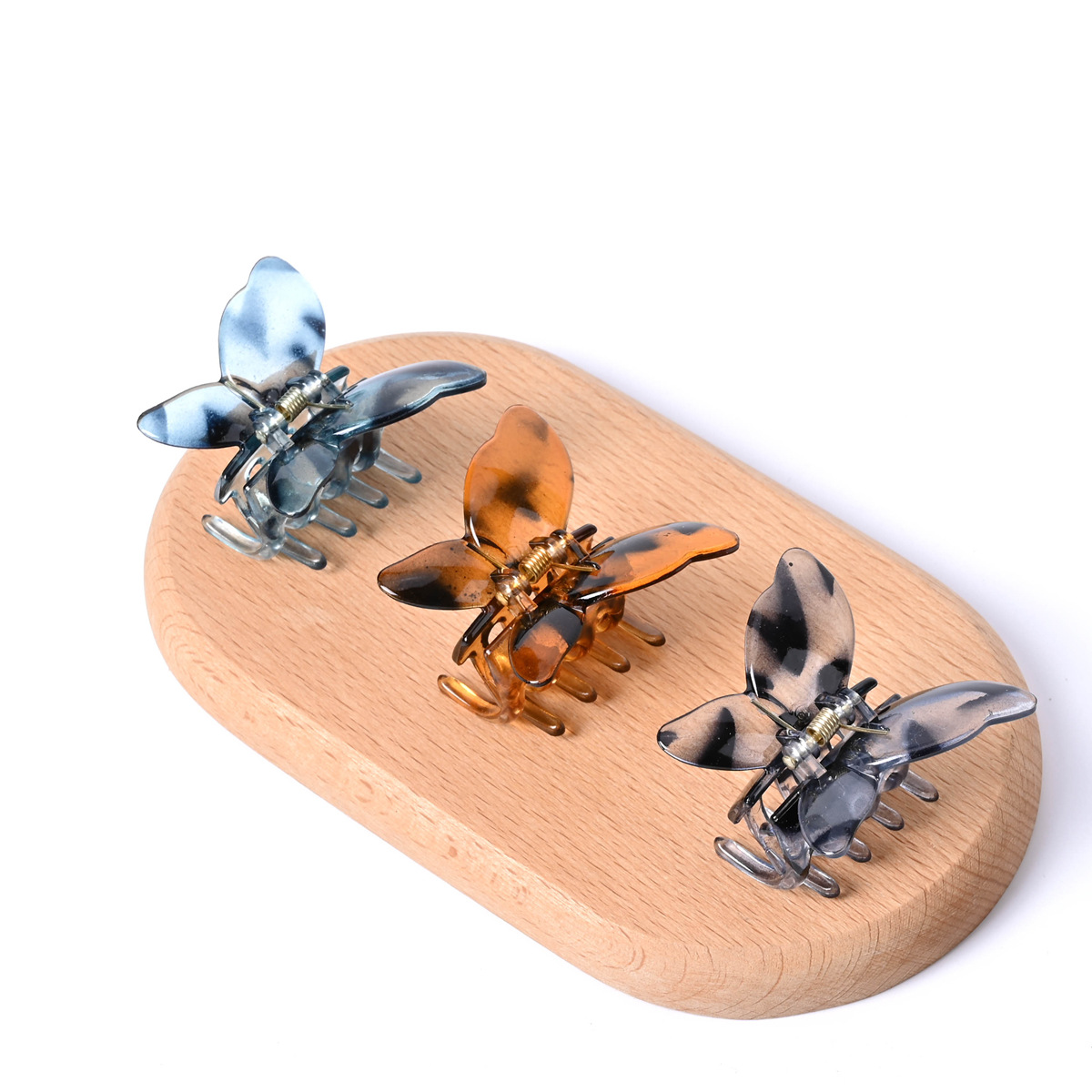 Clip de agarre de mariposa super inmortal nuevo clip de cabello de cristal de peces de tiburón para mujeres celebridades en línea ins clip de cabello de tiburón tocado transfronterizo