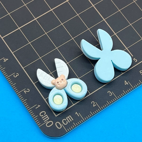 Blue scissors, with little bears