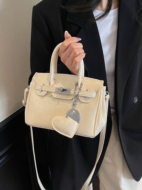 Bolso de platino popular europeo y americano transfronterizo para mujer 2025 nuevo bolso de hombro de nicho simple de moda bolso de mensajero de todo fósforo