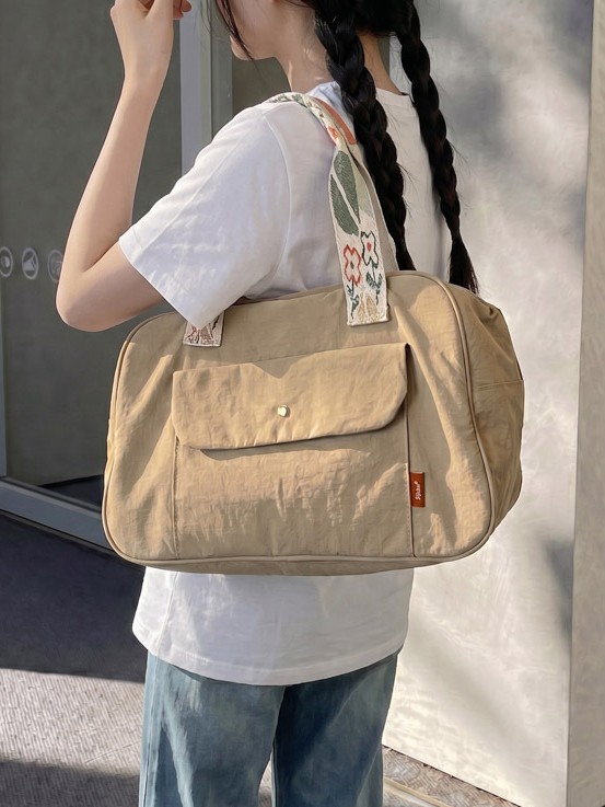 Bolso de mano de gran capacidad para mujeres 2026 bolso de brazo ligero simple de hombro para viajar bolso de viaje