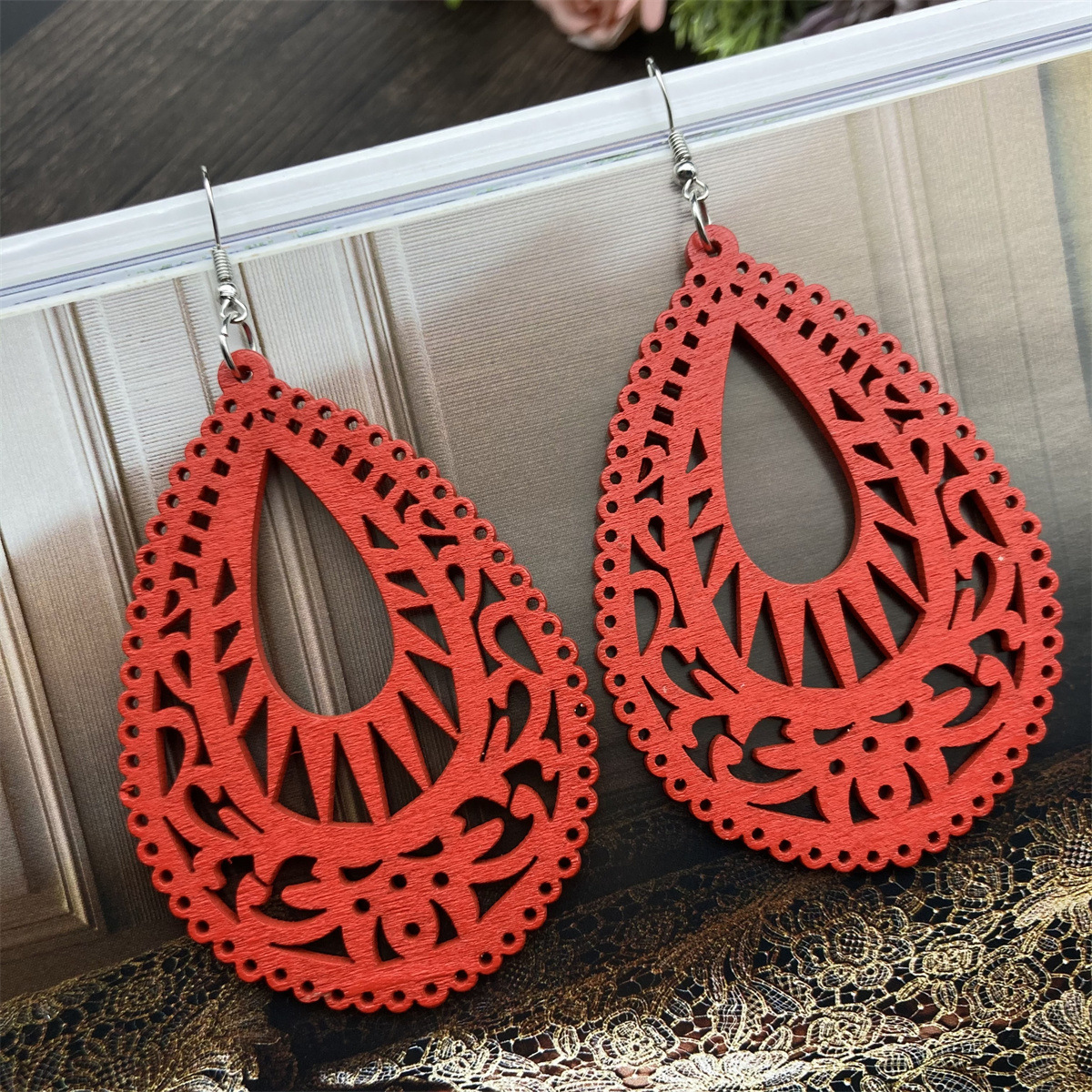 1 Pair Casual Ethnic Style Water Droplets Stoving Varnish Hollow Out Wood Drop Earrings display picture 1