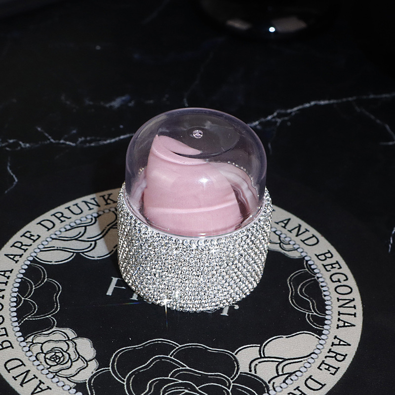 Caja de almacenamiento de huevos de belleza con incrustaciones de diamantes súper suaves a prueba de polvo, maquillaje sin polvo, valor alto, delicado, seco y húmedo, vestido, botella vacía