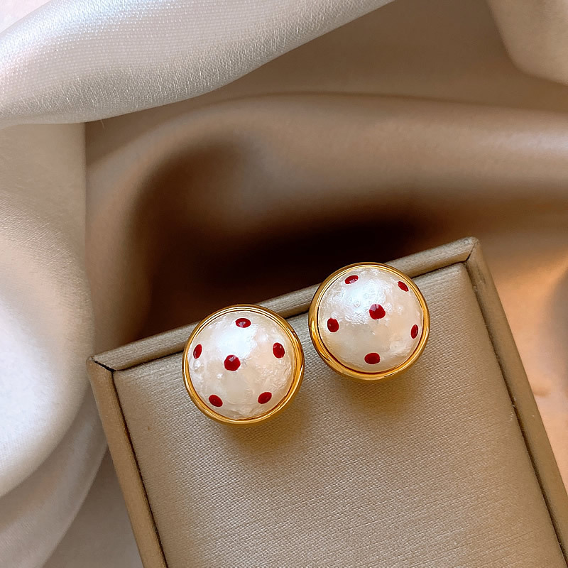 Pendientes de amor de perlas de lujo ligero con aguja de plata Pendientes de sentido de alta gama de temperamento de nicho Pendientes de estilo de palacio de todo fósforo de moda al por mayor