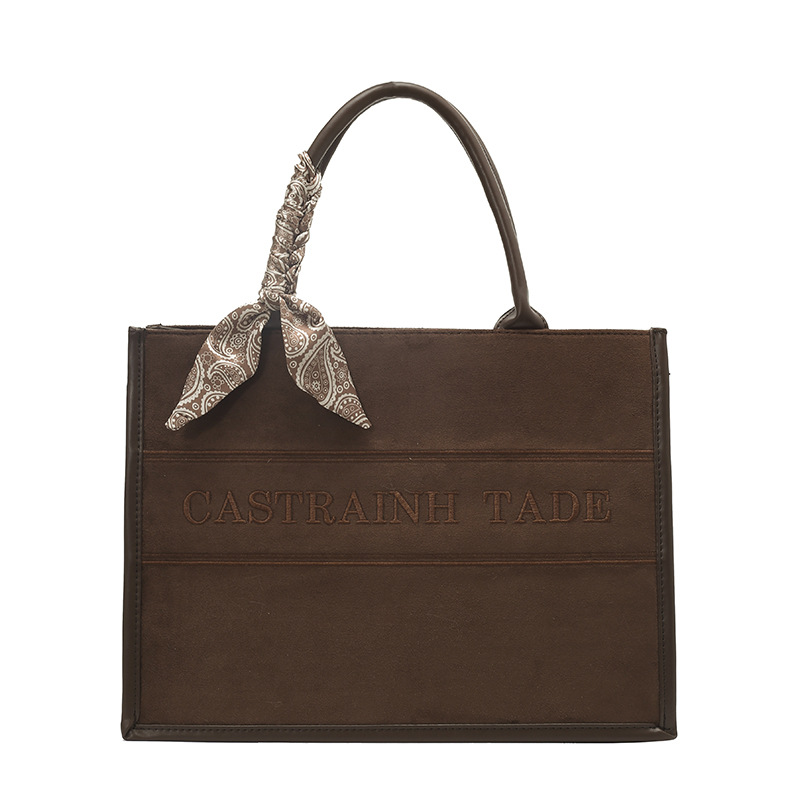 Bolsos de mano de alta textura para mujeres 2025, nuevo tipo transfronterizo de tería retro bordado universal bolso de hombro