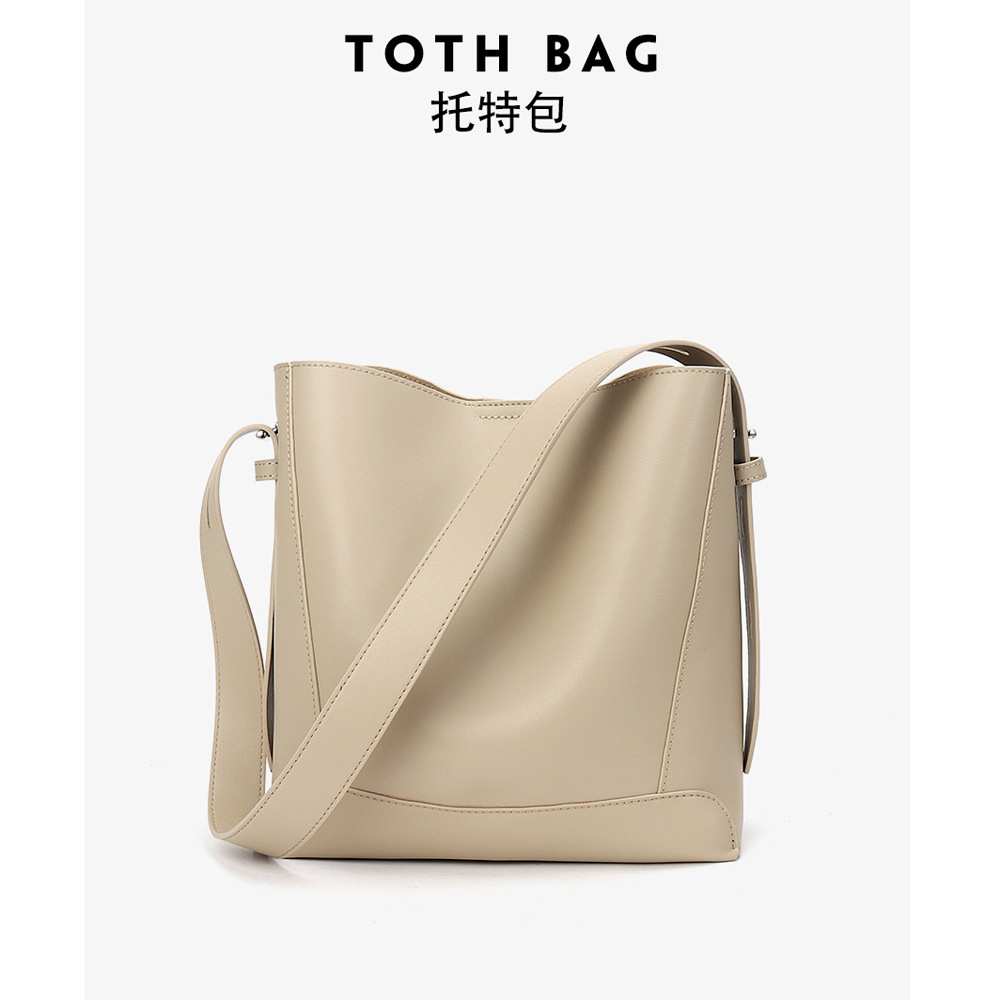 バッグファッションクロスボディバッグニッチデザインシニアセンスショルダーバッグレディースファッションポータブルバケットバッグ通勤レディースバッグ