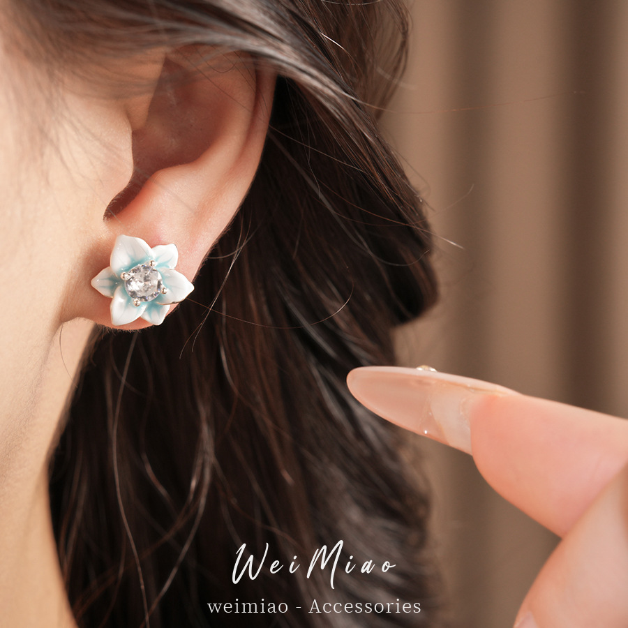 Agujas de plata goteando aceite de piedra de flores de piedra de acoplamiento de vacaciones estilo pastoral aretes dulces aretes ligeros de lujo de alta calidad aretes