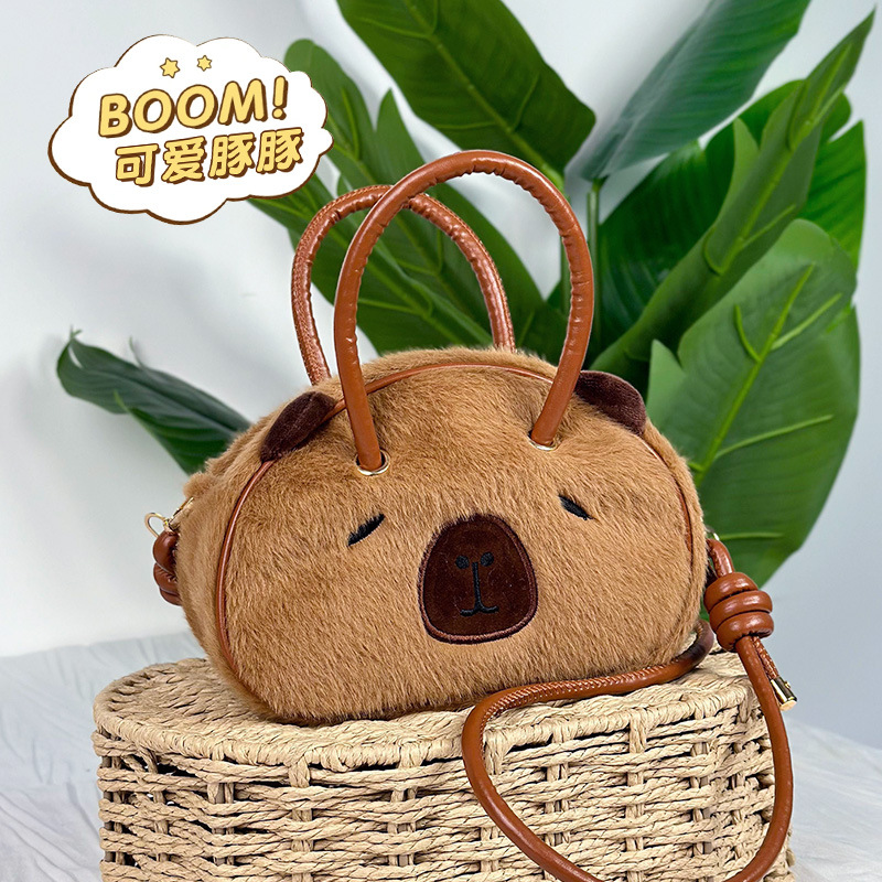 Bolsa de conchas de animales de peluche de red Kapibara muñeca del Dolphin de agua mochila de 8 pulgadas bolsa agarrada al por mayor en stock