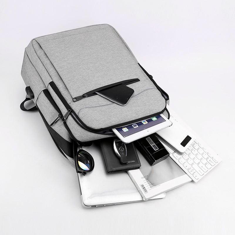 厂家专供男士商务电脑包轻便USB充电简约时尚学生书包双肩背包