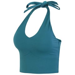 国境を越えた防震が美背に集まってヨガベストを着てランニングトレーニング服を着て痩せている女性が首を掛けて運動下着を着ている