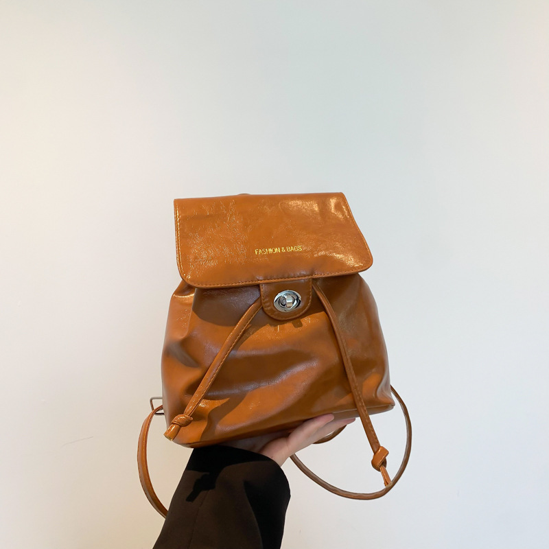 Moda coreana portátil bolso de cubo para mujeres 2024 nueva bolsa de viaje de bloqueo de aire extranjero mochila de ocio