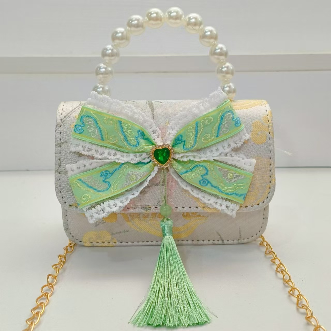 Guofeng arco princesa bolso de perla bolso de hombro bolso de cambio bolso pequeño bolso cuadrado bolso accesorios de ropa de niñas