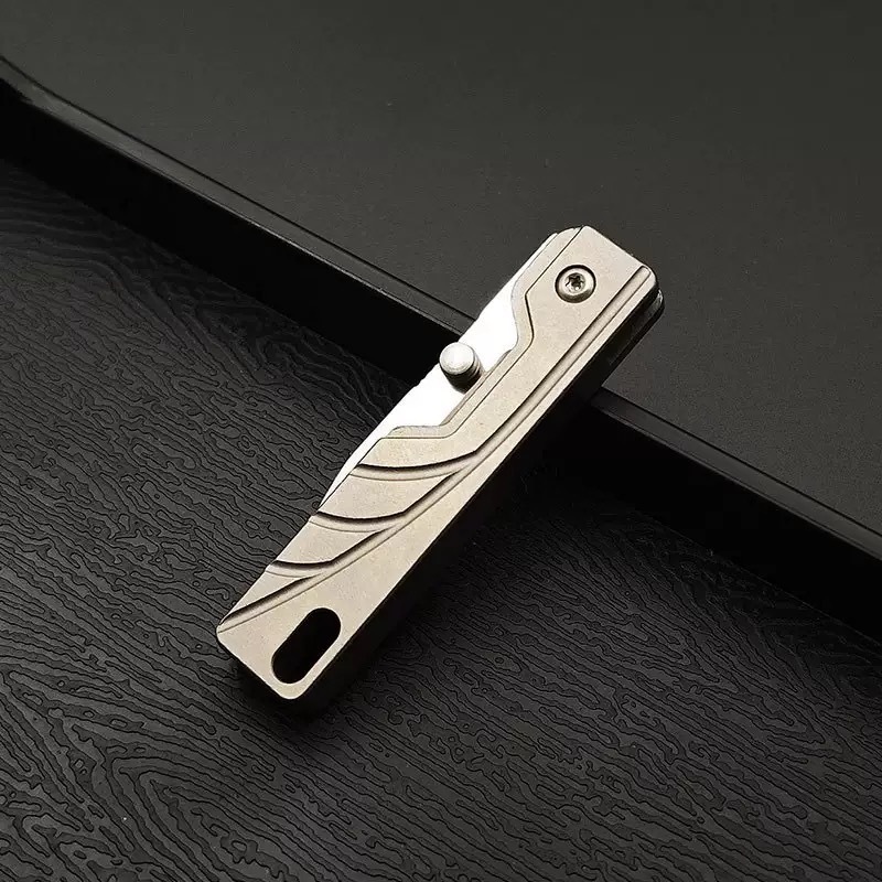 新しいハーフリーフチタン合金ナイフハンドルポケットナイフポータブルキーホルダーナイフアウトドアアドベンチャー折りたたみナイフ|undefined