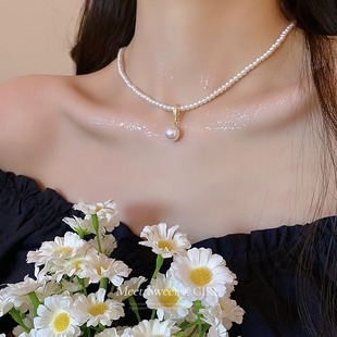 Circle pearl pendant necklace French light luxury simple elegant sweater chain fashion new high sense necklace wholesale