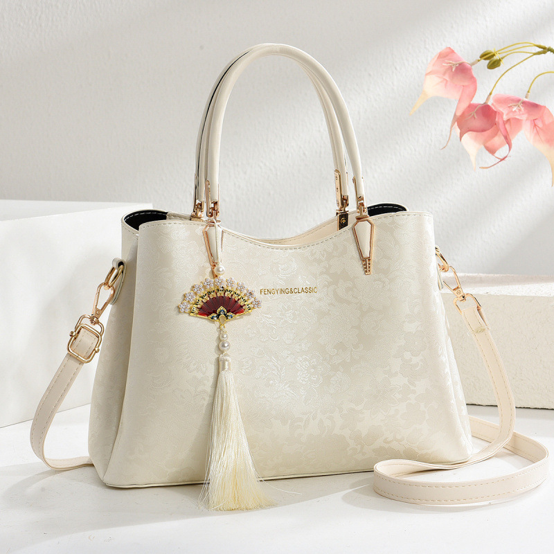 Regalo del Día de la Madre, bolso de moda de madres de mediana edad 2025, nuevo estilo nacional, bolso de mujer chino, bolso de viaje