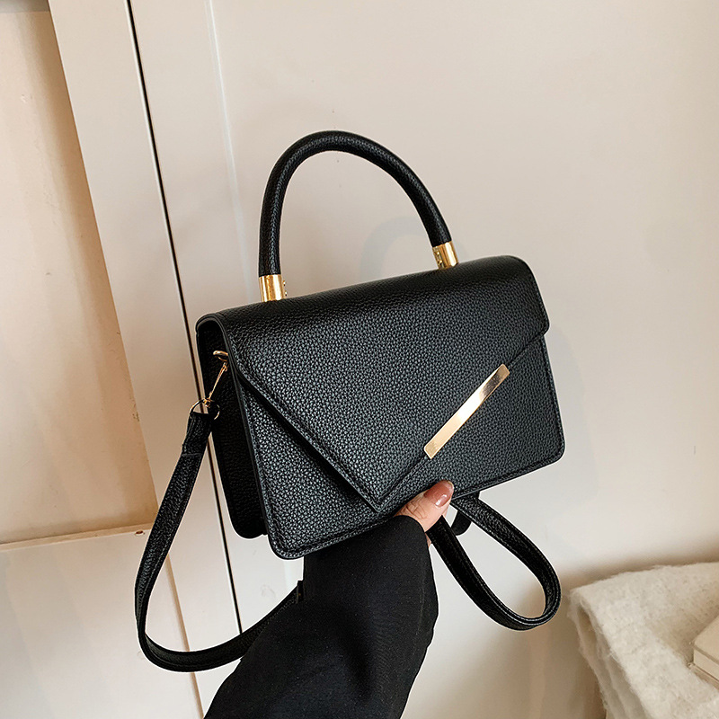 2024 otoño y invierno nuevo estilo versátil bolso de mano de este año popular retro nicho diseño mochila pequeña bolsa cuadrada