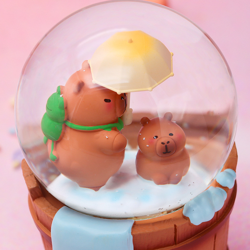 Douyin Little Red Book Venta caliente Kapibara Crystal Ball Música Brillante Nieve, Lindo capibara Decoración Regalo para niños