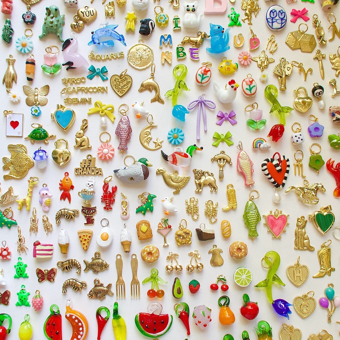 欧美跨境2025秋季多巴胺不锈钢花花西瓜香蕉彩虹四叶草保色吊坠