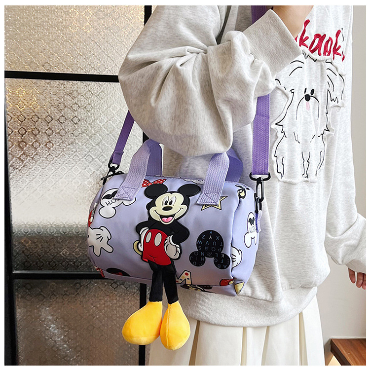 In 2024, the best-selling children's bags will feature cute Mickey Mouse-patterned bowling bags for girls, casual hand-held shoulder bags, and a unique style undefined