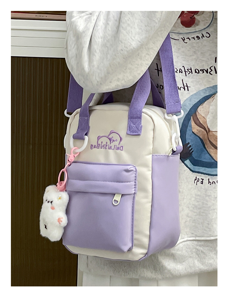 A Japanese niche double-sided multi-purpose bag for girls, a fresh and cute student single-shoulder bag, versatile carrying bear, +3 yuan details Picture