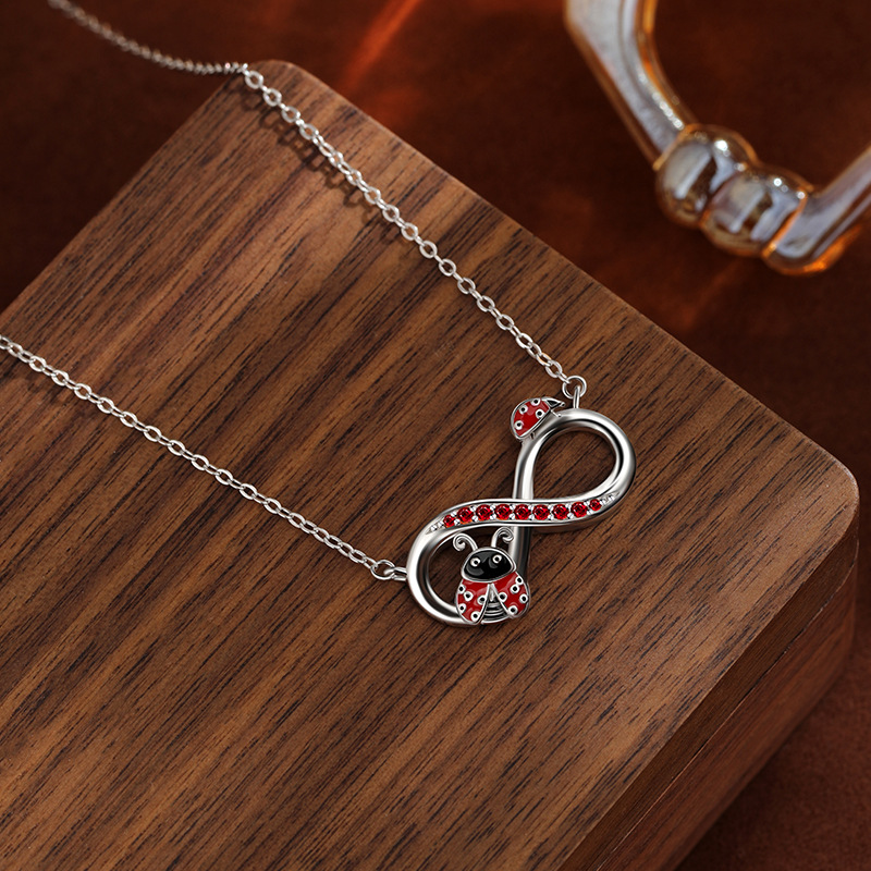 S925 plata de ley, símbolo infinito, collar de mariquita, lujo ligero femenino, nicho, sentido de alta gama, cadena de clavícula de comercio exterior de Amazon europea y americana