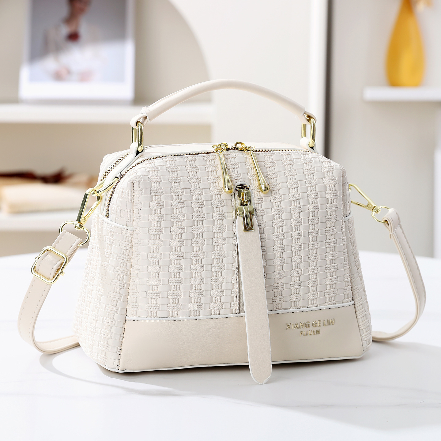 2026 nuevo temperamento de moda tejido bolso de mano textura casual mochila de hombro de gran capacidad bolso de viaje