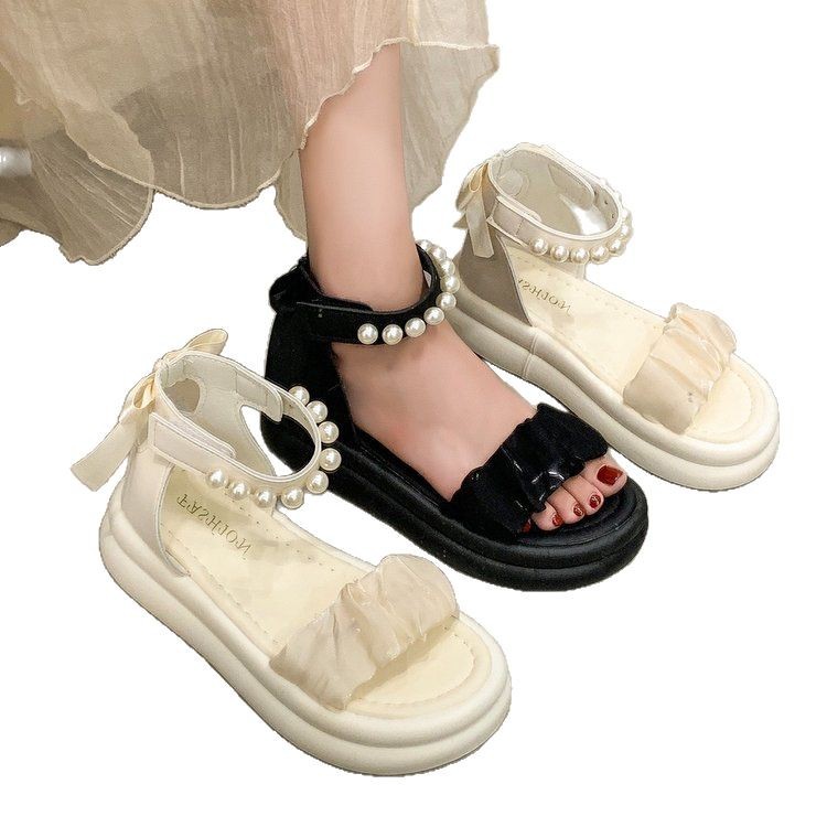 Sandalias francesas para mujer verano 2025 nuevo estilo rojo estilo caliente ligero y de alto valor moda sandalias de todo fósforo para mujer con falda