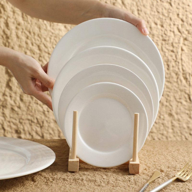 Restaurante de platos de comida occidental redonda de cerámica blanca pura Phnom Penh plato de filete de alta gama plato plano escupir hueso plato plato plato plato plato plato