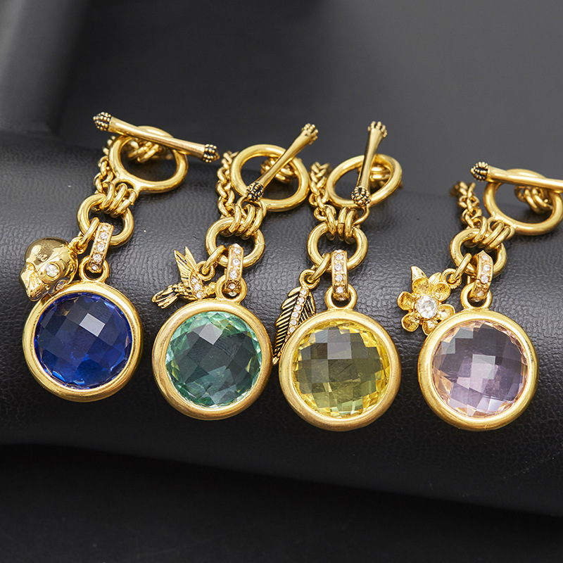 Wholesale European and American retro fashion colorful Crystal Gem Skull flower bird leaf pendant t buckle bracelet for women