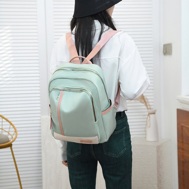 Nueva mochila de tela Oxford para mujer, versión coreana de gran capacidad, mochila de estilo universitario salvaje, bolsa de viaje ligera impermeable
