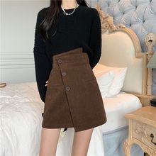 UNMUN秋冬新款高腰显瘦半身裙灯芯绒不规则遮肚包臀裙大码咖色A字