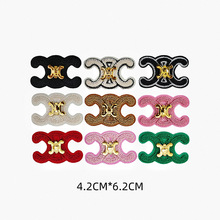 厂家直销时尚潮流异形手缝五金中空绣花章服装辅料鞋服箱包装饰品