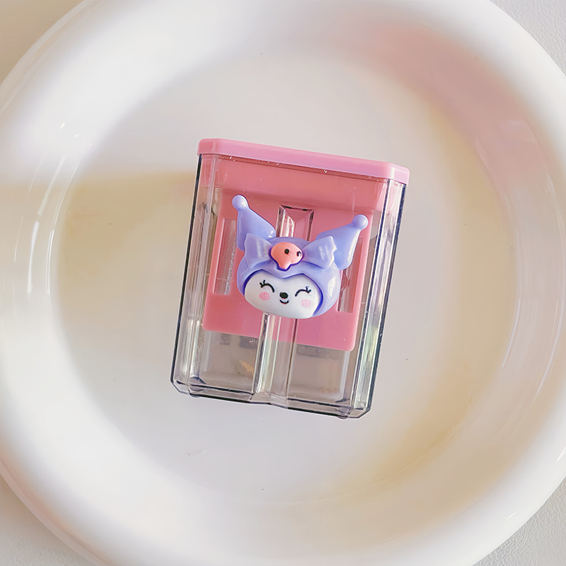 漫画の二重穴の学生のかわいい携帯の筆を回転する刀の子供の太い鉛筆は筆を削ります。|undefined