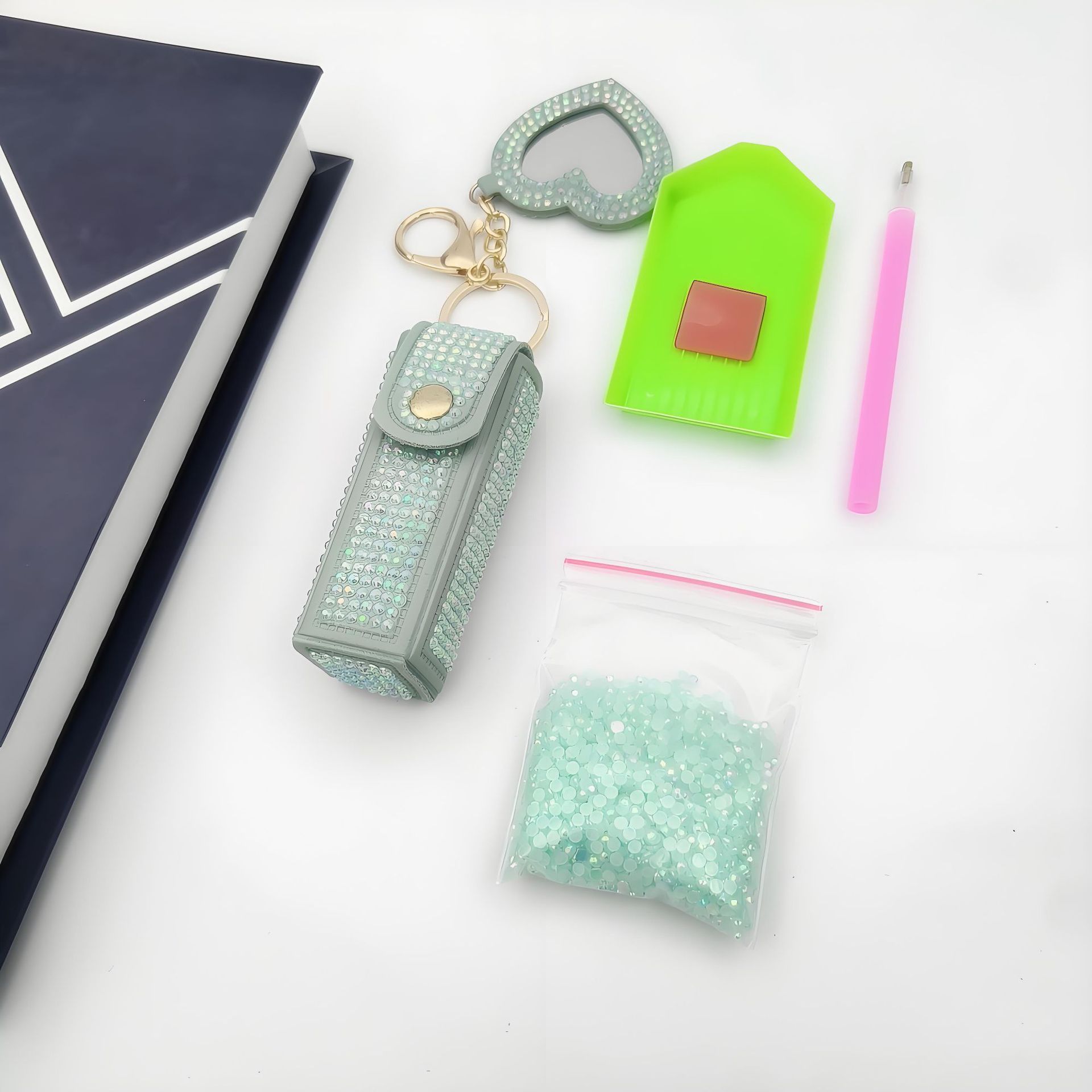 Bolso de cambio transfronterizo sobre rojo espejo creativo llavero colgante pequeño PU cuero bolso de coche accesorios accesorios en stock