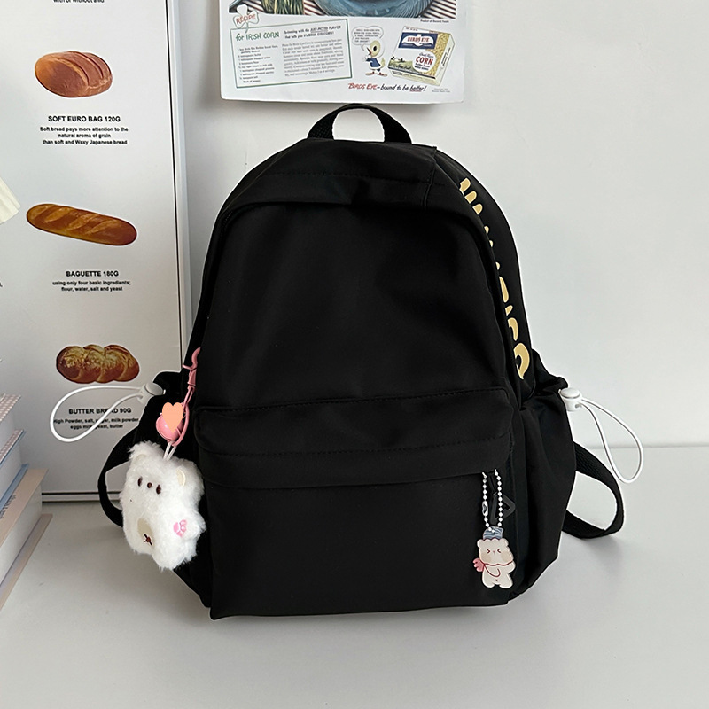 Mochila de gran capacidad para estudiantes de secundaria femenina simple y versátil para estudiantes de secundaria japonesa mochila de diseño