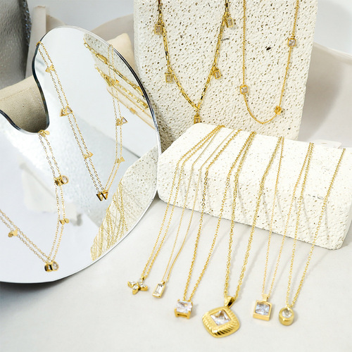 Simple white four-leaf clover zircon necklace, versatile, high-end and non-fading love titanium steel clavicle chain jewelry set