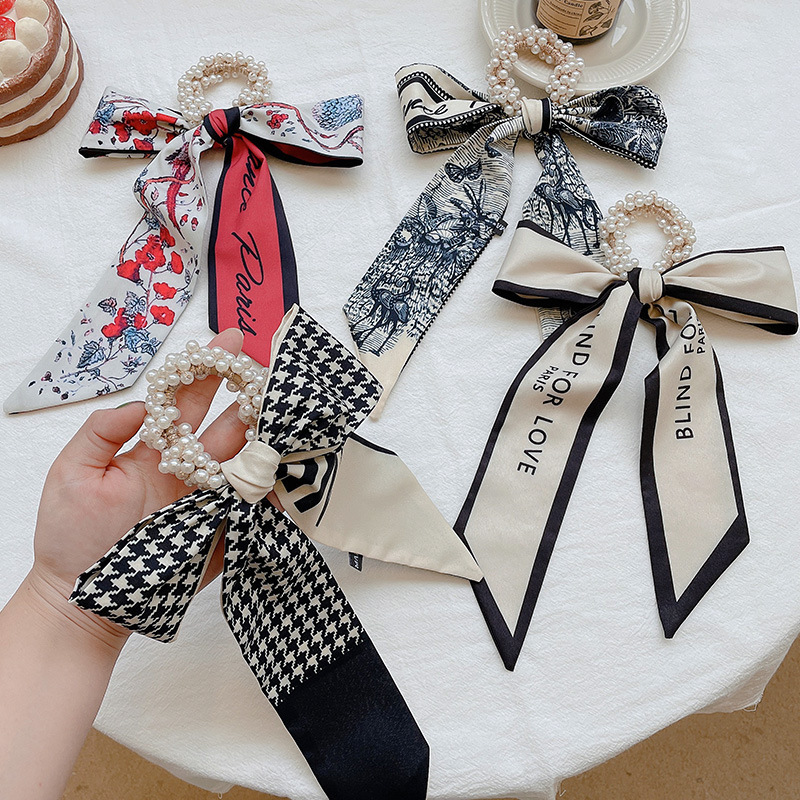 Banda de pelo de bufanda de seda para mujer corbata de pelo fino de verano de perlas cinta de arco Hada cuerda de pelo de todo fósforo estilo coreano accesorios para el cabello al por mayor