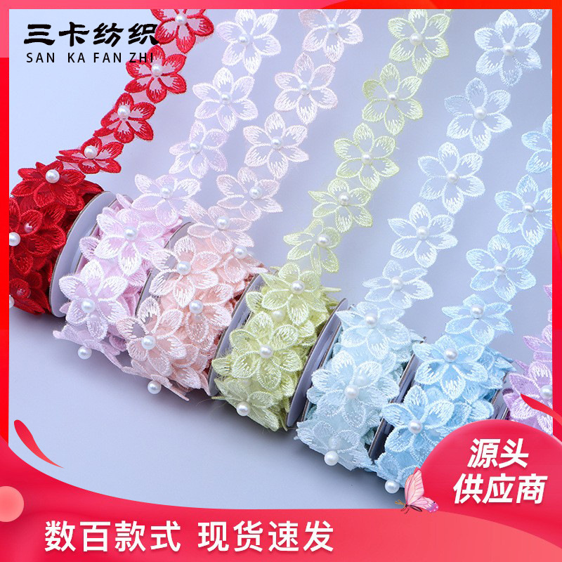 En stock 3,3 cm de una sola capa de flores bordadas de seis pétalos de flores orden perla encaje de organza de encaje ropa de falda de DIY