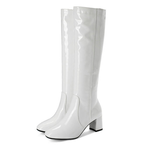 Stylish tall boot with thick sole, suitable for stage performance and nightclubs, featuring a slimming design and over-the-knee length.