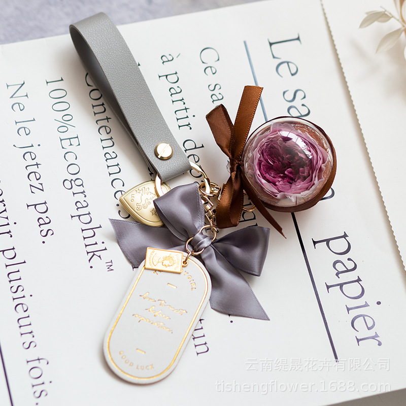 Cruz-frontera Amazon eterna flor llavero terminado Austin Rosa caja de regalo bolsa colgante de cuero marcador colgante