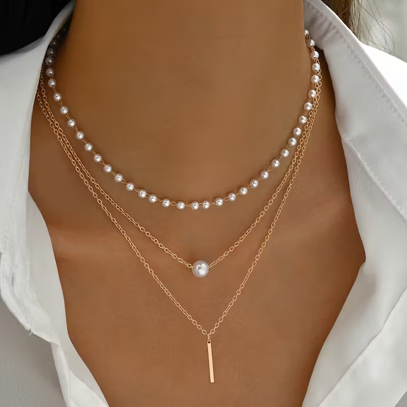 Collana di perle con fiocco a y e ciondolo a nappa_voghion.com