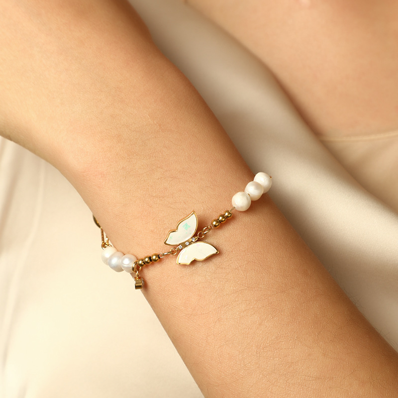 Cross-border exclusive stainless steel 14K gold chain butterfly pearl bracelet INS wind niche design gold-plated bracelet wholesale