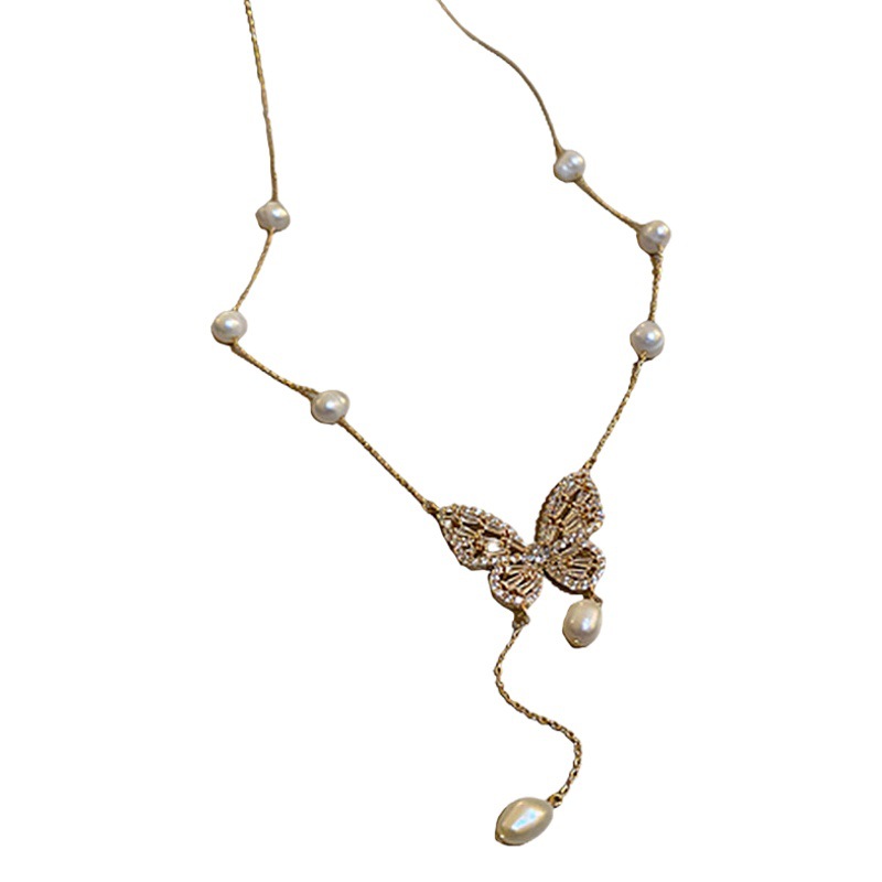 Oro real electrochapado perla de agua dulce micro incrustaciones ZIRCON mariposa borla collar diseño sentido clavícula cadena temperamento ins collar